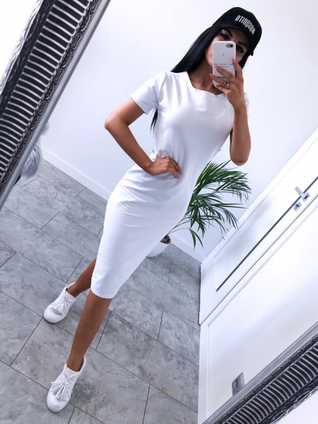 Dopasowana sukienka midi...